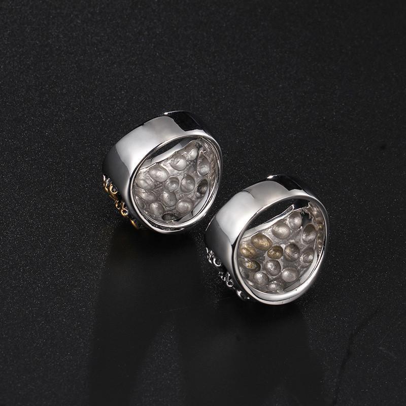 A stunning Stainless Steel Bikers Skeleton Ring adorned with shimmering crystals.