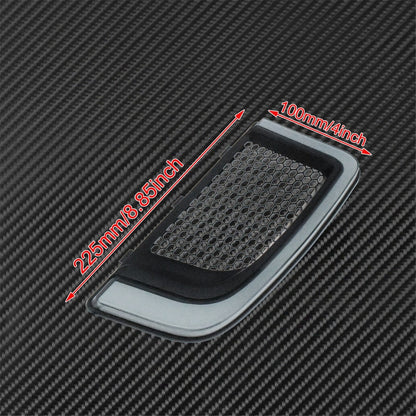 A sleek black Motorcycle LED Turn Signal Light Fairing Lower Grills for Harley Touring cover for a car door.