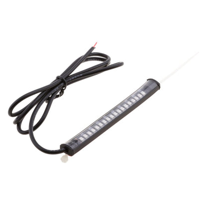 Enhance your ride with the Motorcycle Fork Smoked LED Turn Signal Strip Lights Kit, compatible with Harley Davidson 39mm-41mm forks. This sleek black LED strip includes a connecting cable and exposed wires, perfect for functioning as stylish motorcycle turn signals.