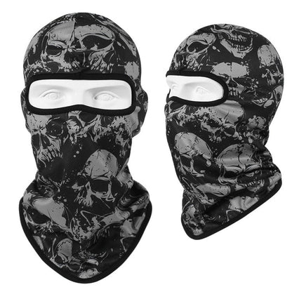 Two Skull Balaclava Full Face Masks with a black and grey pattern, featuring an eye opening, are displayed on head mannequins against a white background. Perfect for skiing, snowboarding, or motorcycle rides, these full face masks offer both style and warmth.