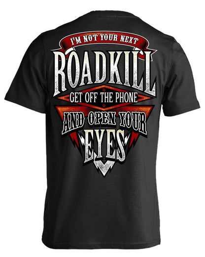 Introducing our new "I'm Not Your Next Roadkill Get Off The Phone And Open Your Eyes" tees - an attractive print on a black t-shirt made with high-quality cotton.