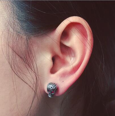 Red Eye Skull Stud Earrings for Men & Women, Stainless Steel/Crystal,  0.4 x 0.3 in - American Legend Rider