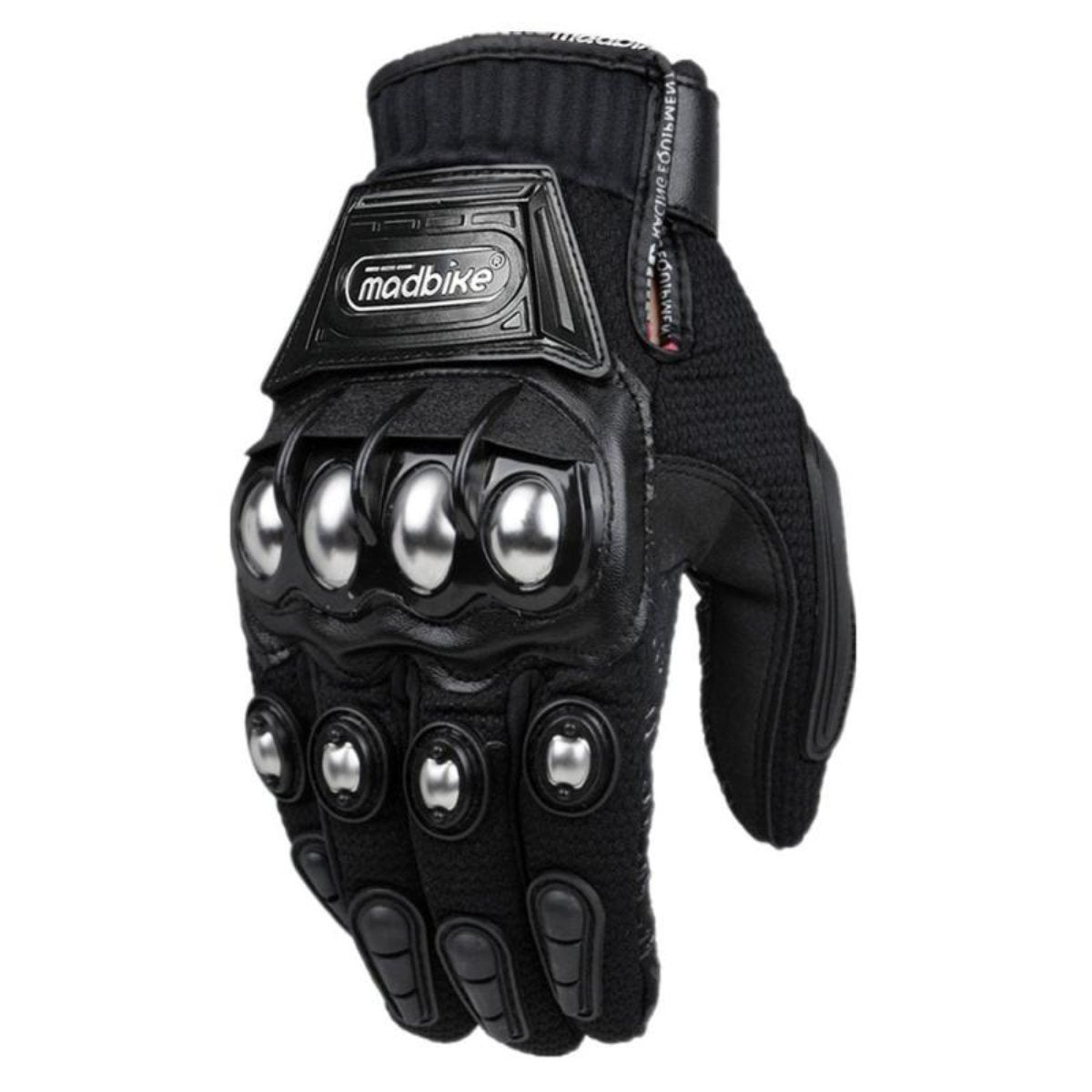 Motorcycle rider wearing Madbike gloves, gripping the handlebars.