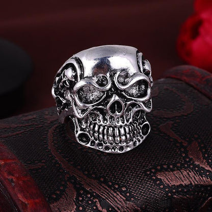 A silver Punk Ring on top of a box.